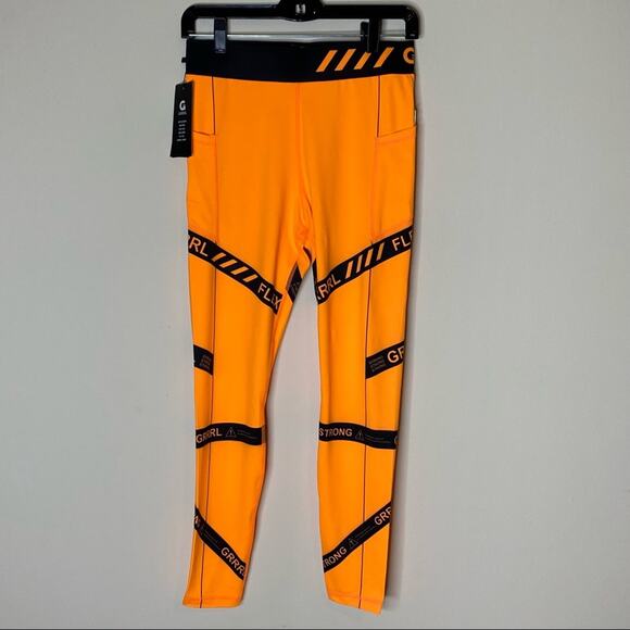 GRRRL Amanda Heather Leggings Orange Black Flex Strong Workout Pants Pocket NWT - Picture 1 of 6